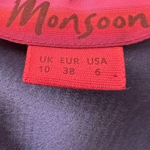 Form fitting dress with subtle ruffle detail